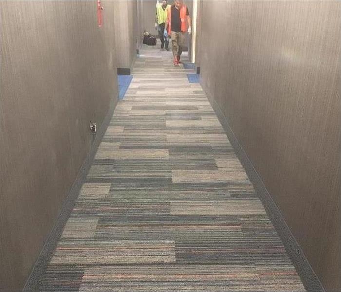 workers hallway restored gray